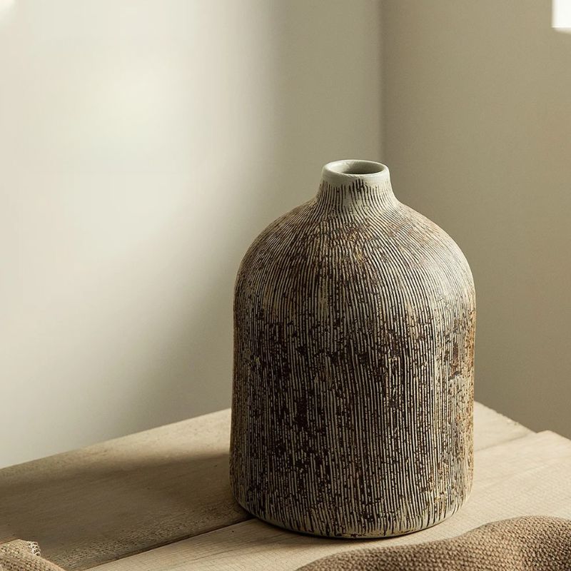 Raffinatezza Orientale con un Vaso Rotondo in Ceramica