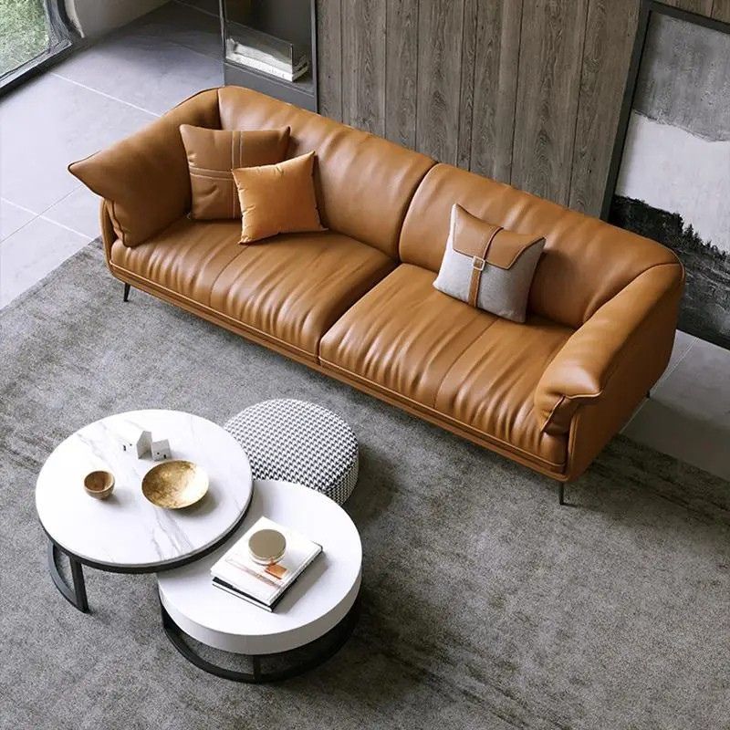 Eleganza e Comfort – Divano in Pelle Minimalista per un Living Moderno