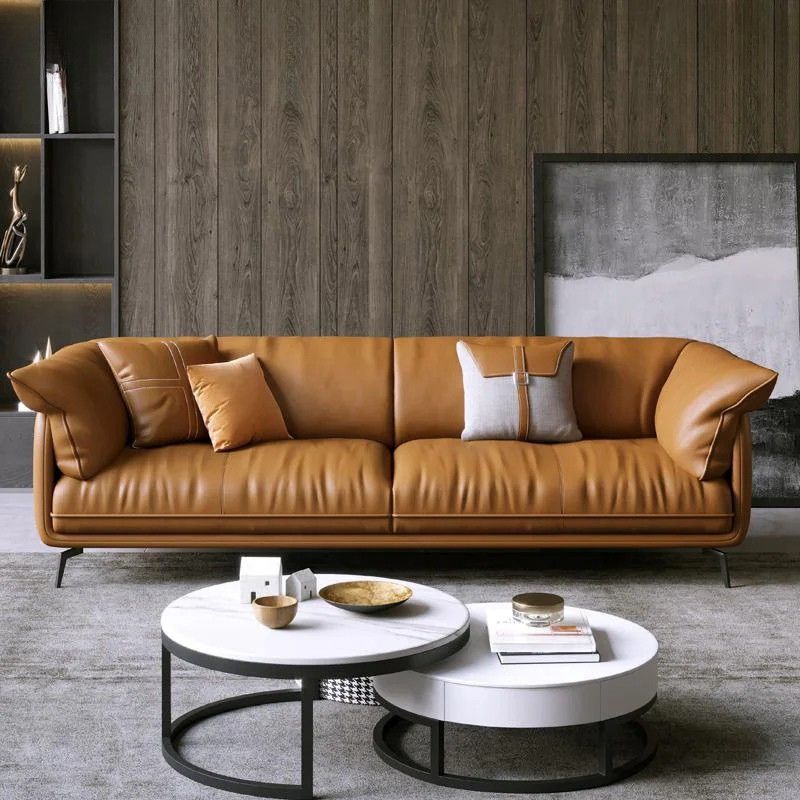 Eleganza e Comfort – Divano in Pelle Minimalista per un Living Moderno